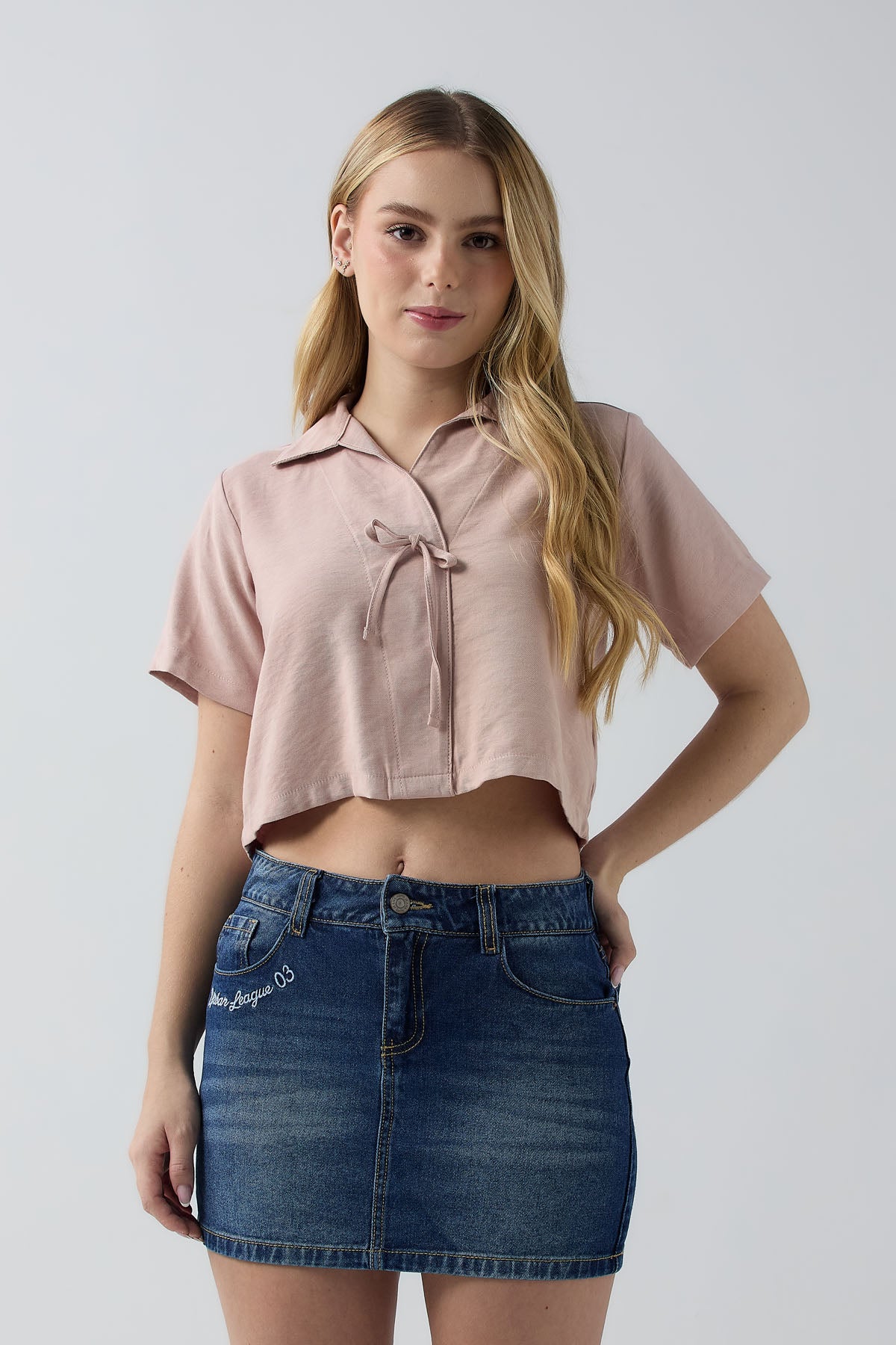 Blusa rosa con moño decorativo en frente para jóvenes