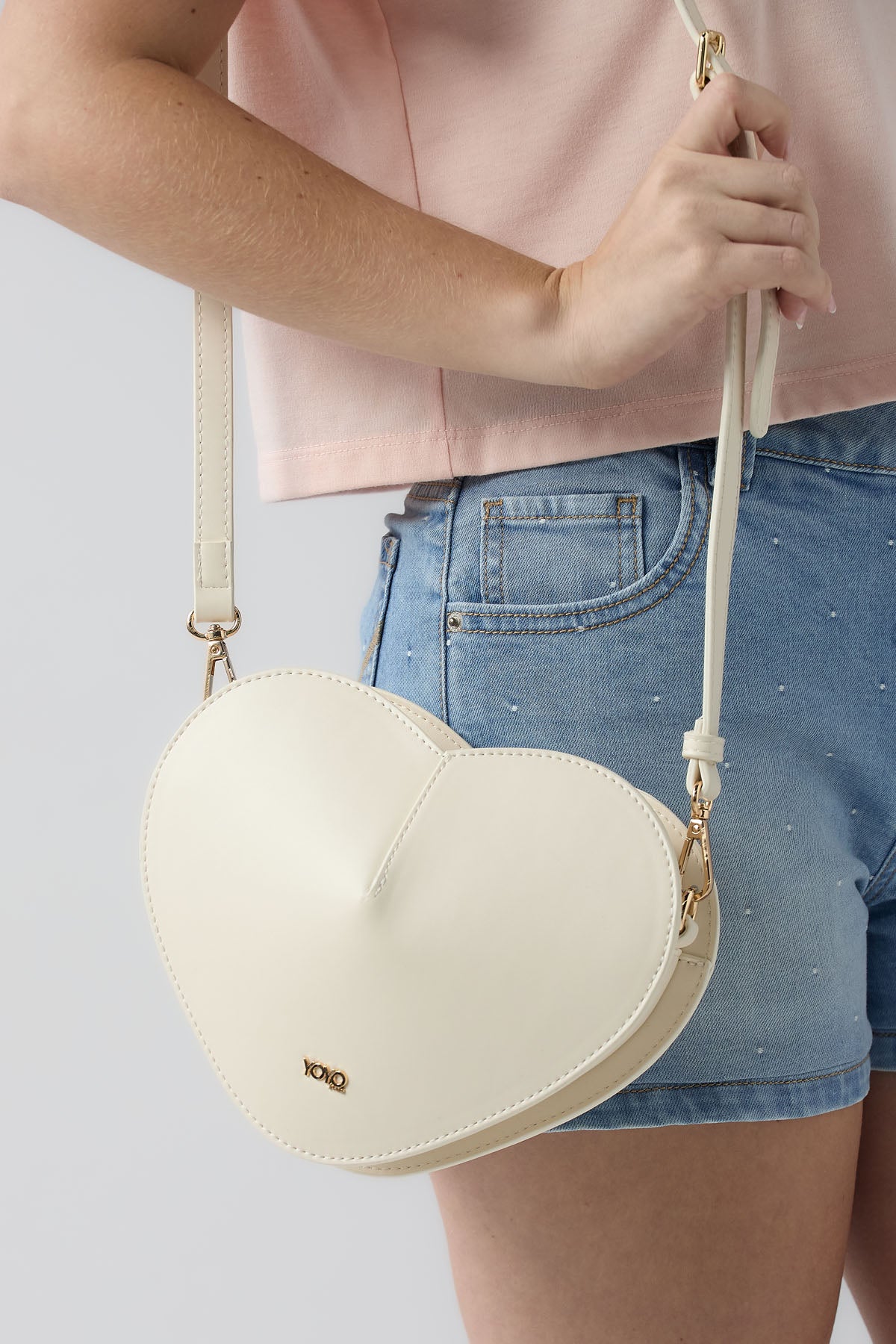 Bolso bandolera marfil en forma de corazón para jóvenes