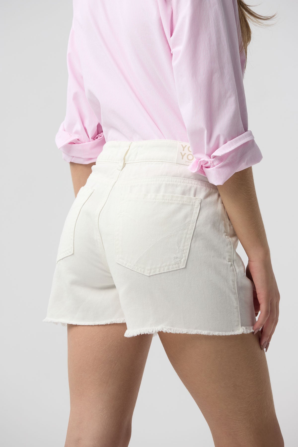 Short marfil de tiro alto para jóvenes