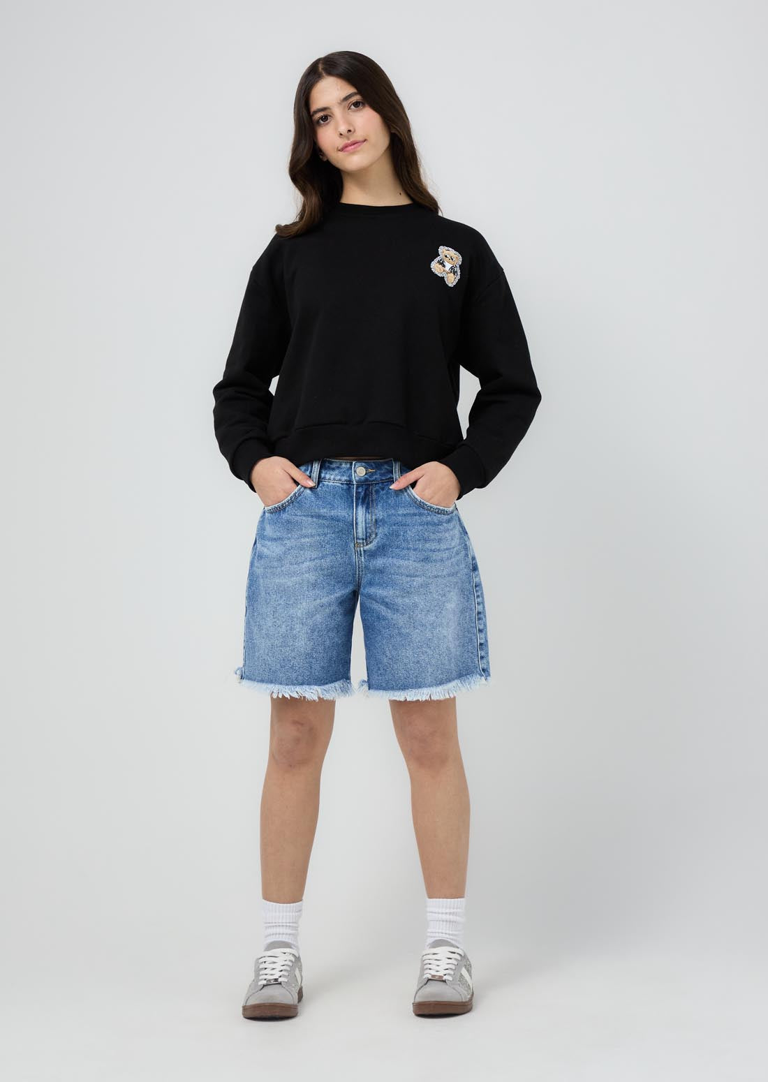 Bermuda lavado medio con desgaste en bota para jóvenes