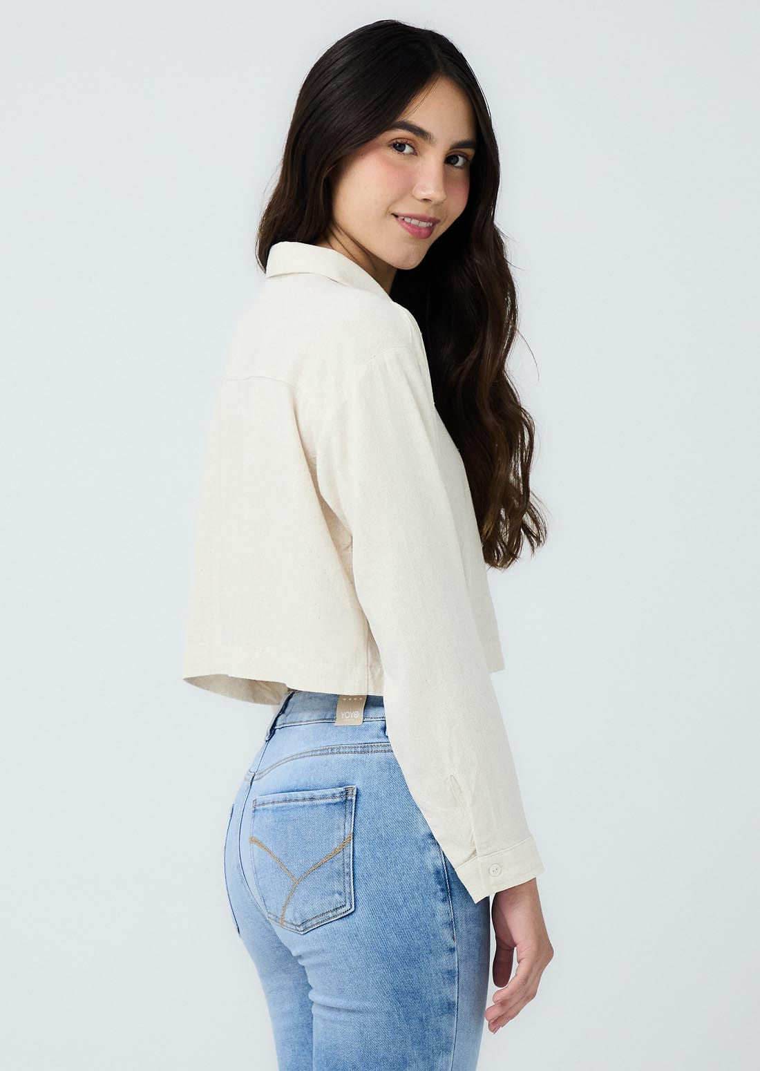 Blusa arena con bolsillo en frente para jóvenes