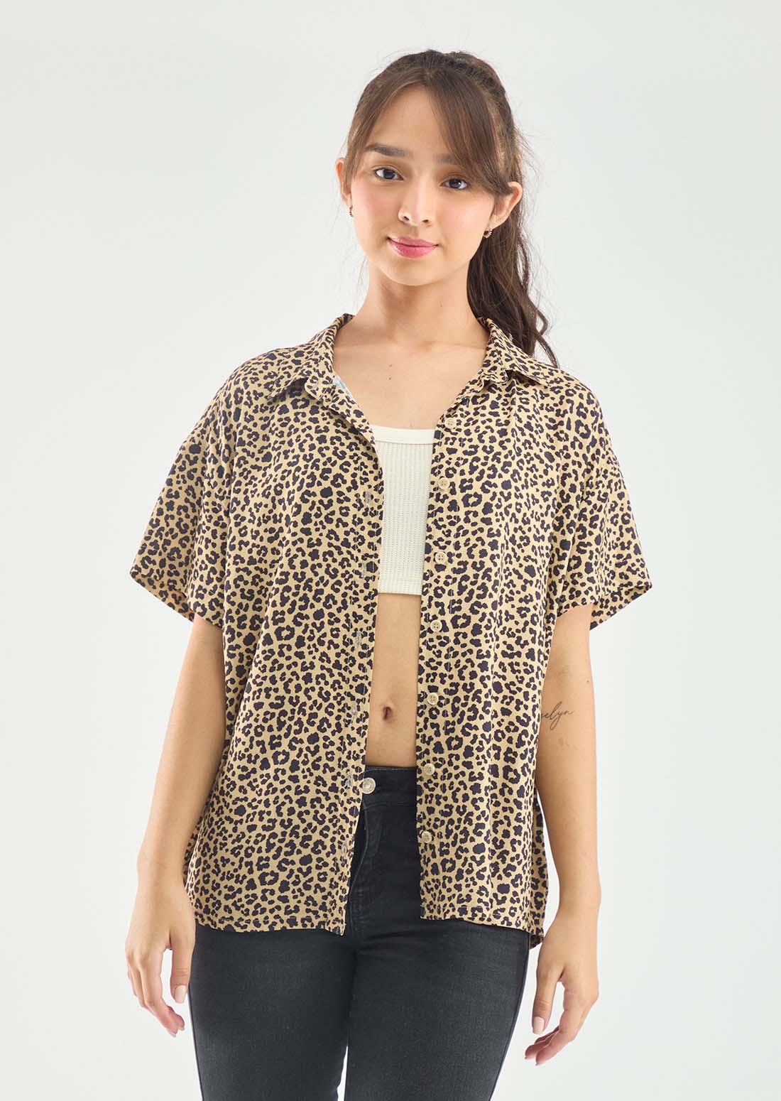 Blusa oversize arena estampada para jóvenes