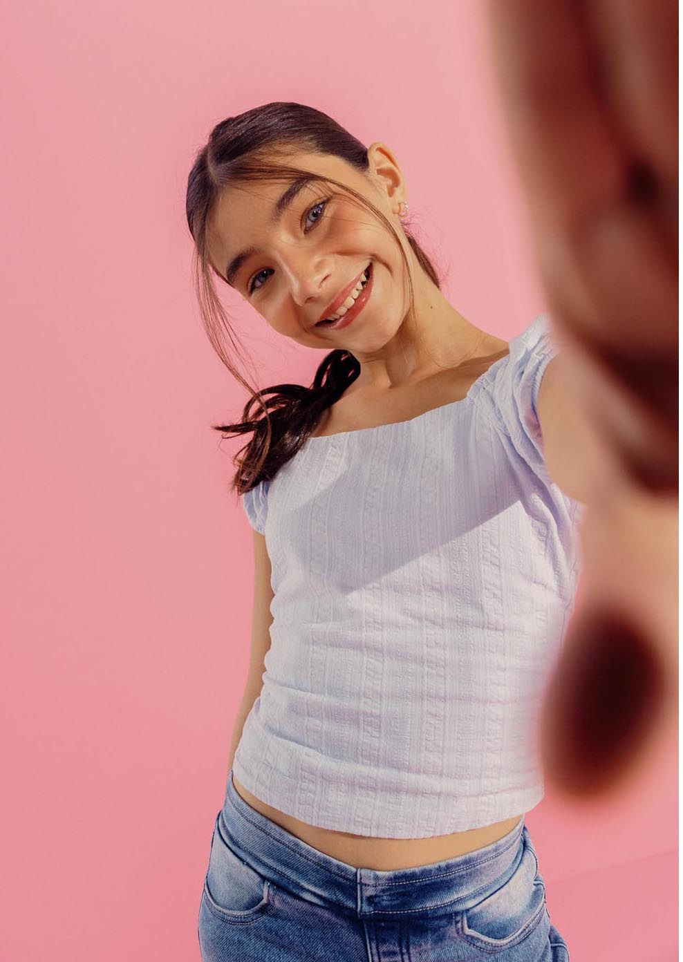 Blusa azul claro con nido de abejas para niñas