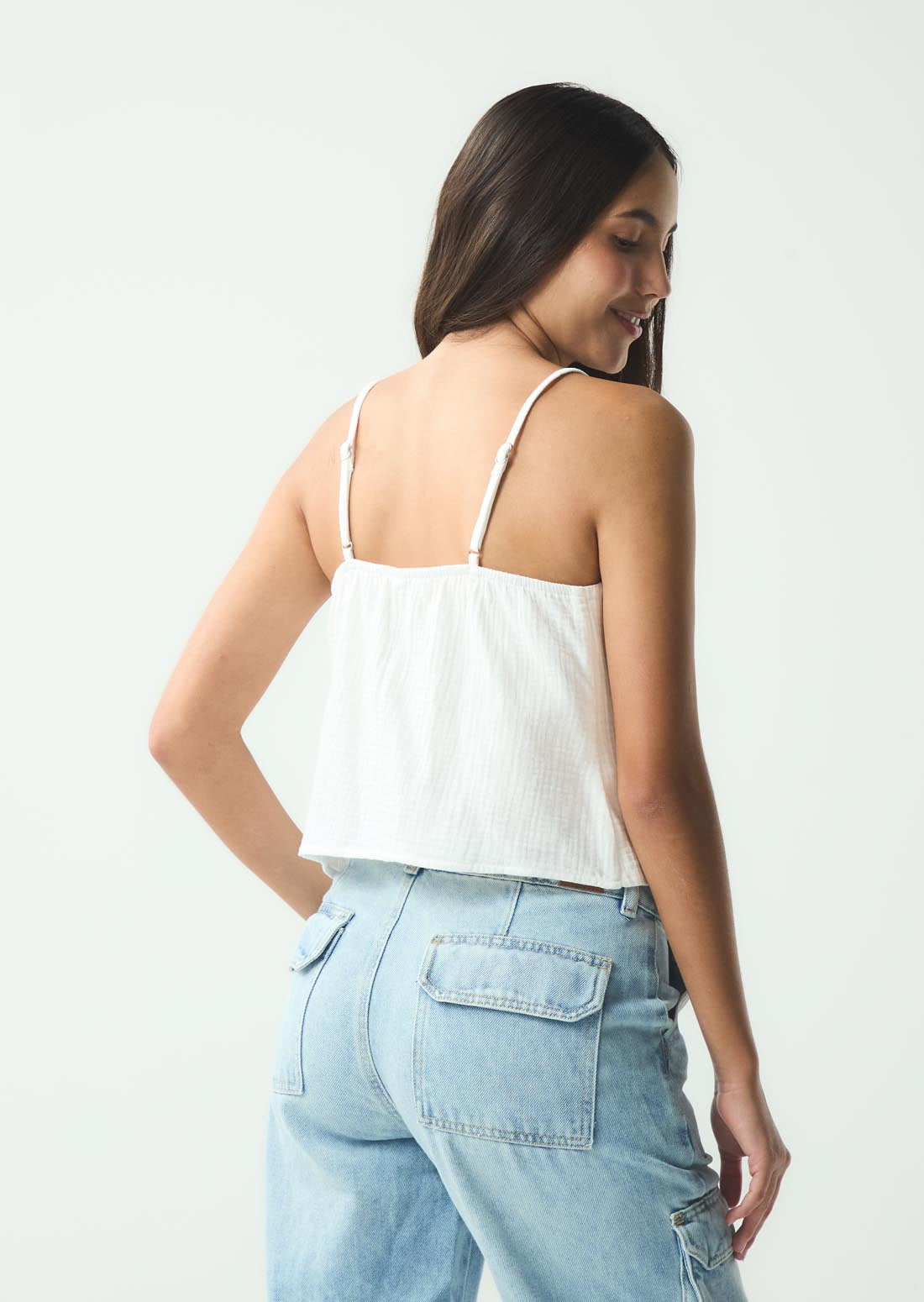 Blusa marfil con amarre en frente para jóvenes