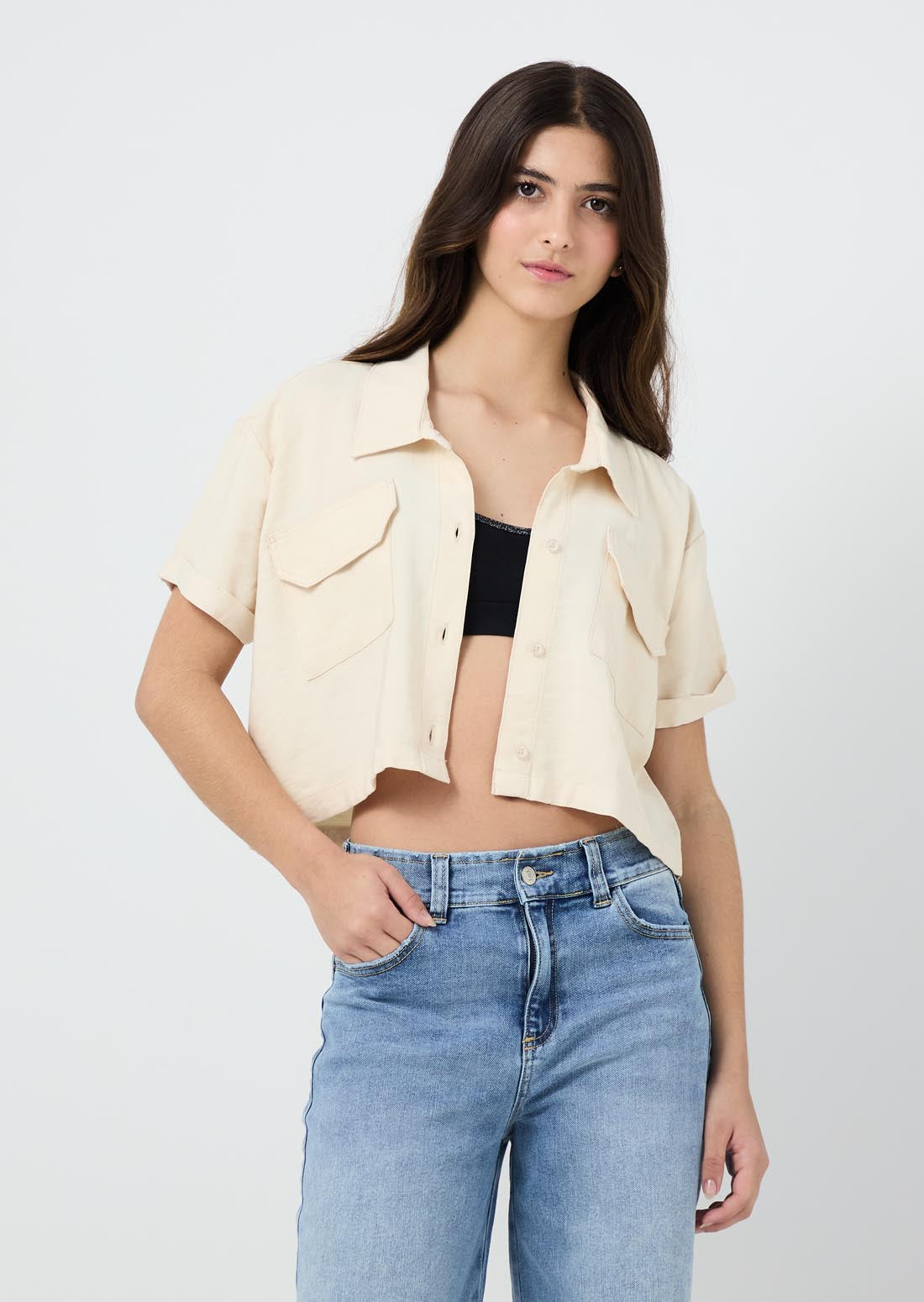 Blusa arena con bolsillos en frente para jóvenes