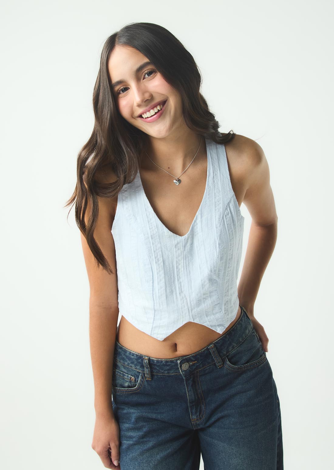 Blusa azul claro con cierre en costado para jóvenes