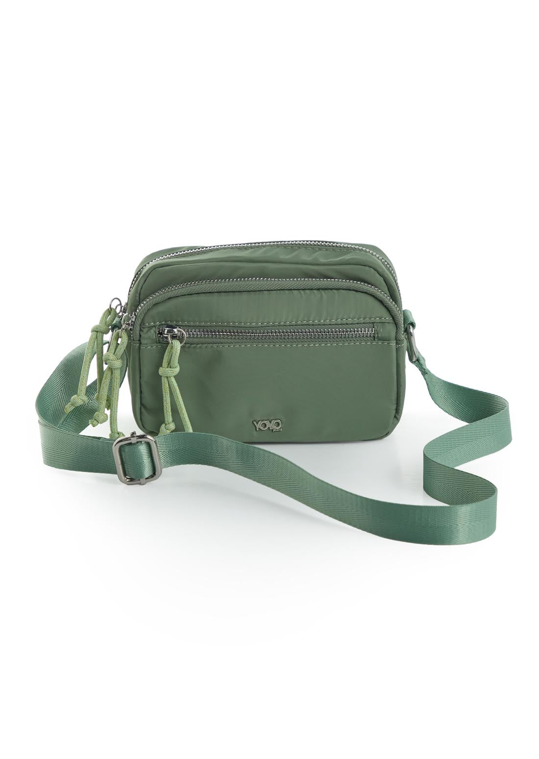 Bolso verde con haladeras en contraste para jóvenes