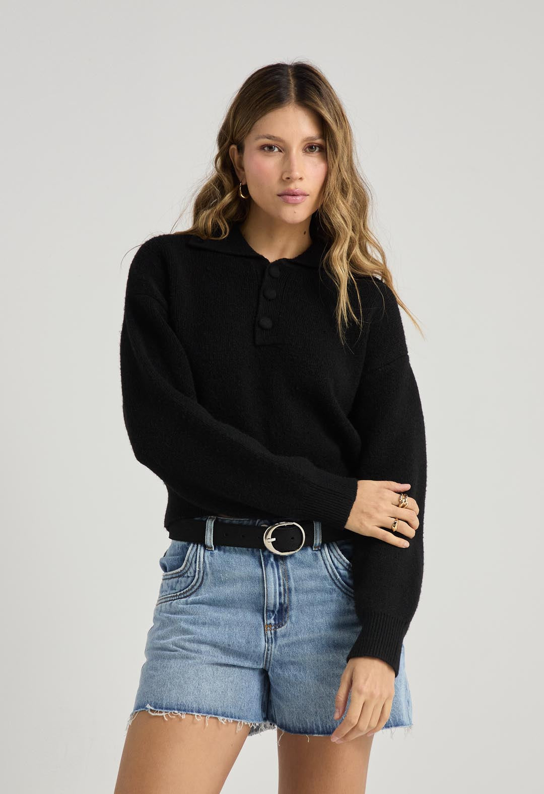 Buzo tejido negro con cuello tipo polo para mujer