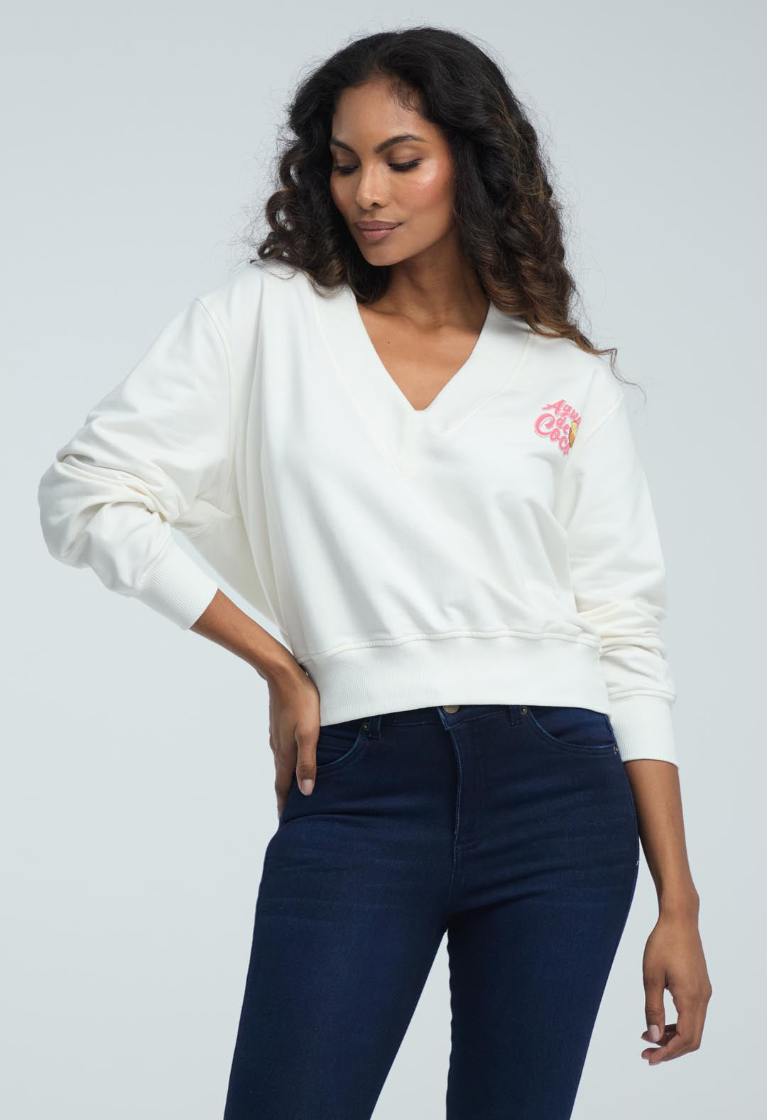 Buzo marfil con cuello en V para mujeres