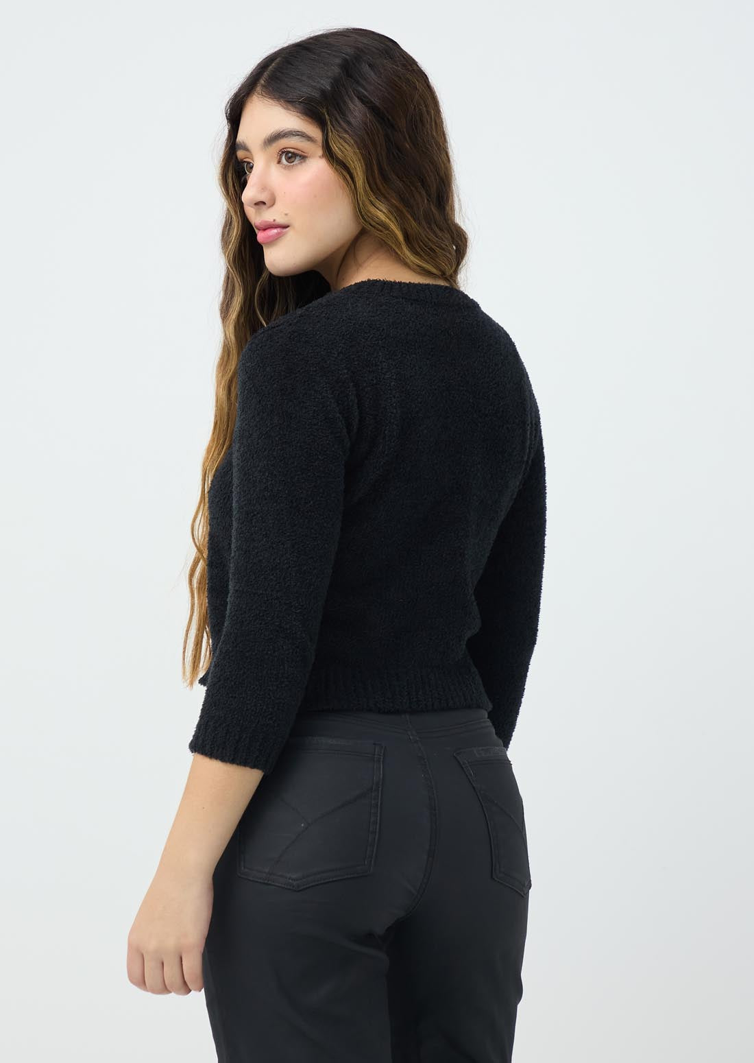 Buzo tejido negro con estrella para jóvenes