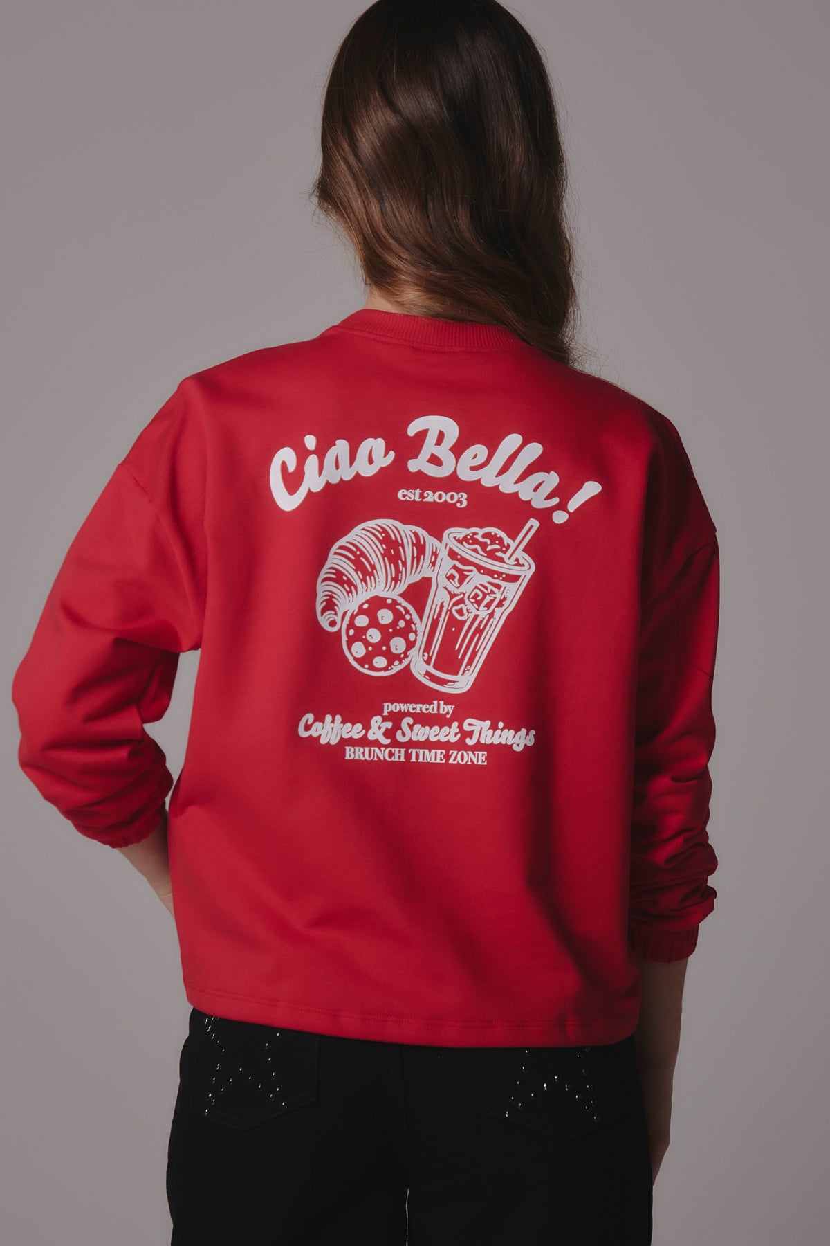 Buzo coral oscuro estampado en ambas caras para jóvenes