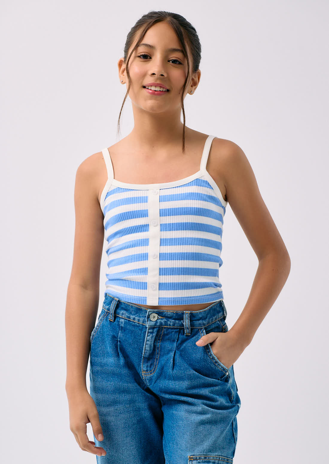 Camiseta azul claro con botones para niñas