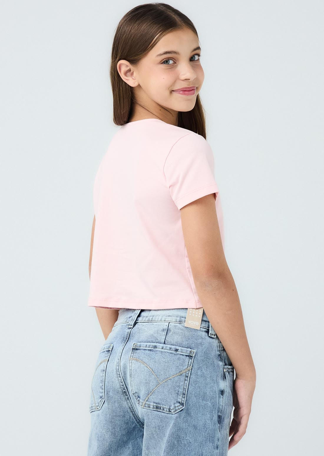 Camiseta rosa pastel frente cruzado para niñas