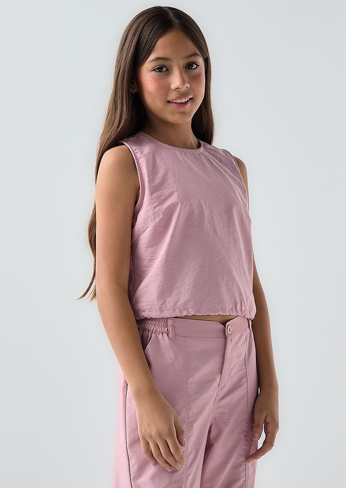 Blusa palo de rosa tipo parachute para jóvenes