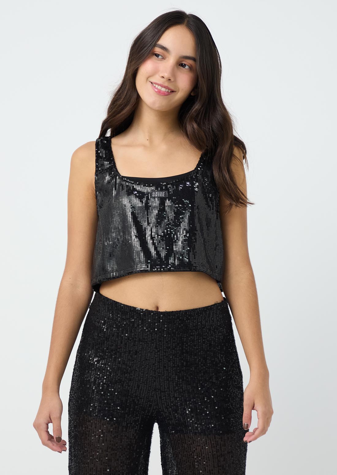 Camiseta negra con brillo para jóvenes