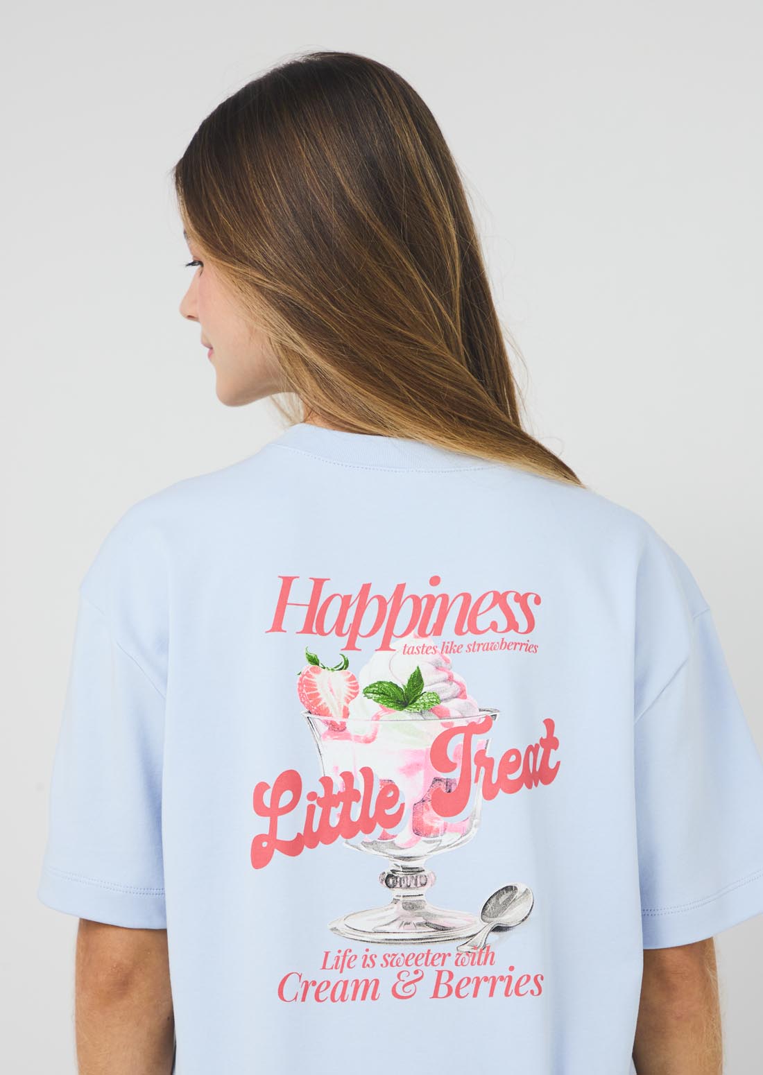 Camiseta azul claro estampada en frente para jóvenes