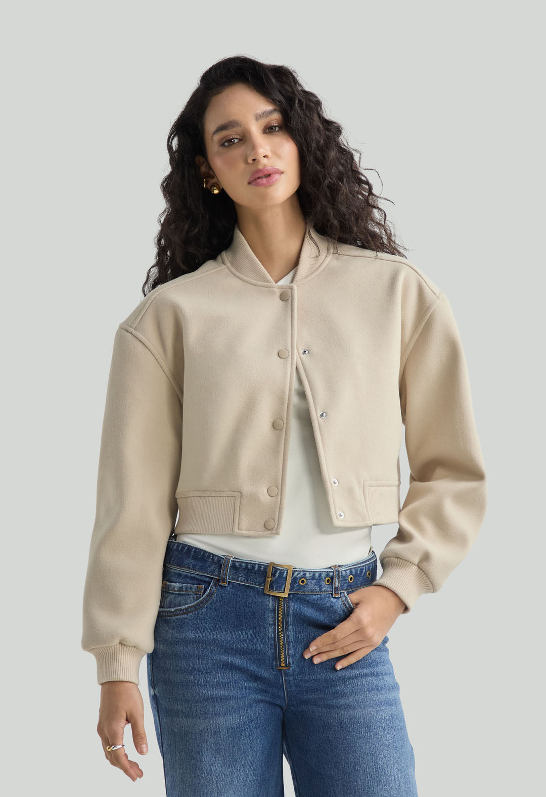 Chaqueta arena con puño en rib para mujer