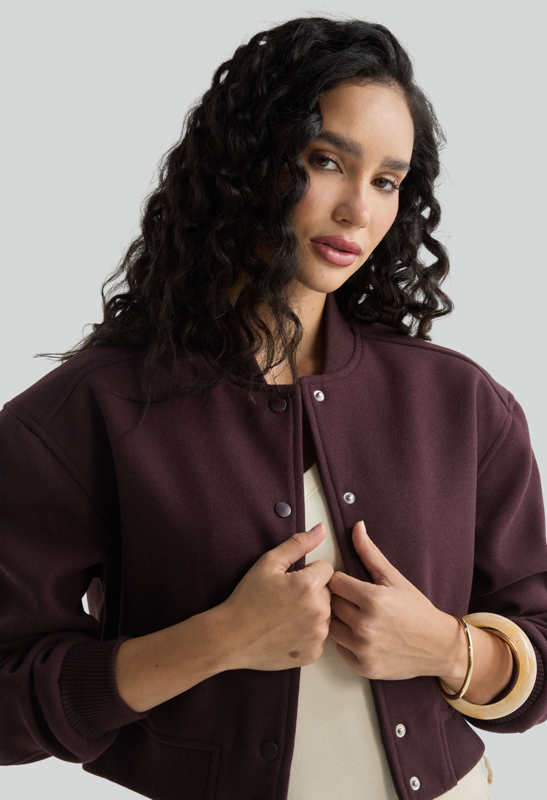 Chaqueta vino con puño en rib para mujer