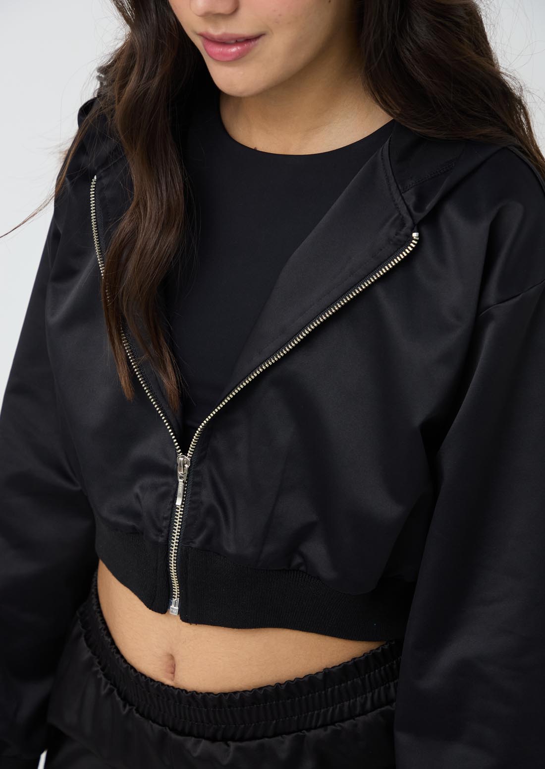 Chaqueta negra con puños en rectilíneo para jóvenes