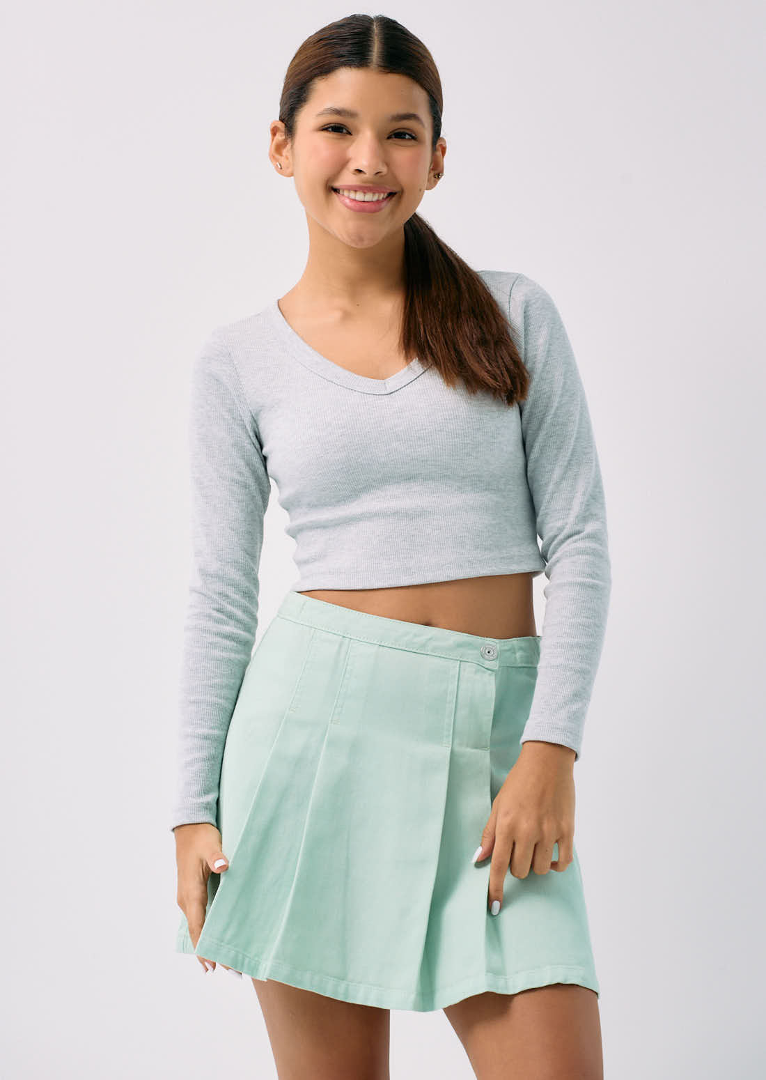 Falda verde menta tableada para adolescentes