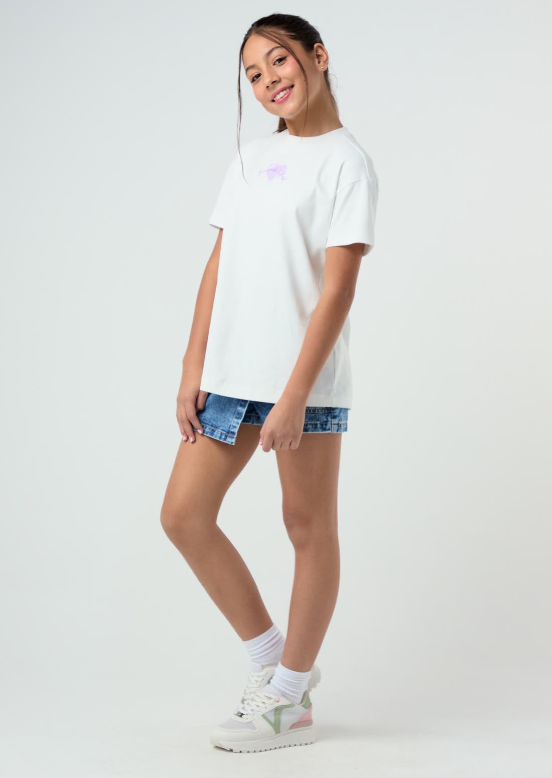 Falda short medio oscuro y tiro alto para niñas