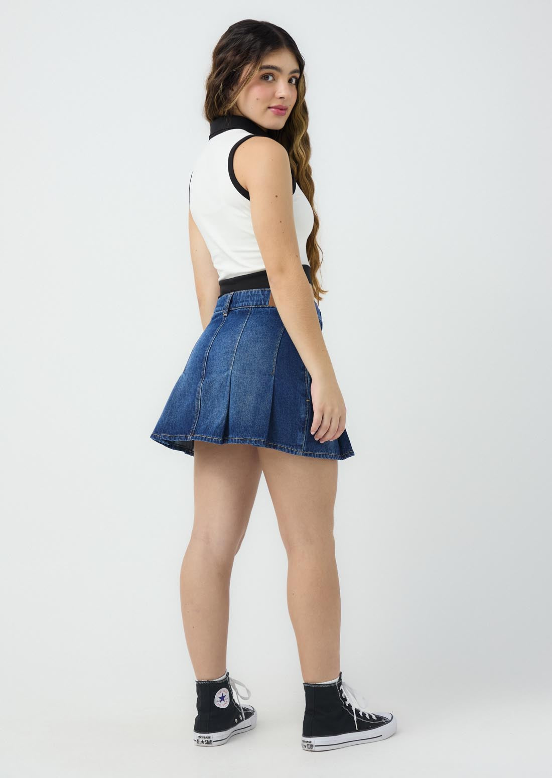 Falda medio oscuro tiro medio para jóvenes