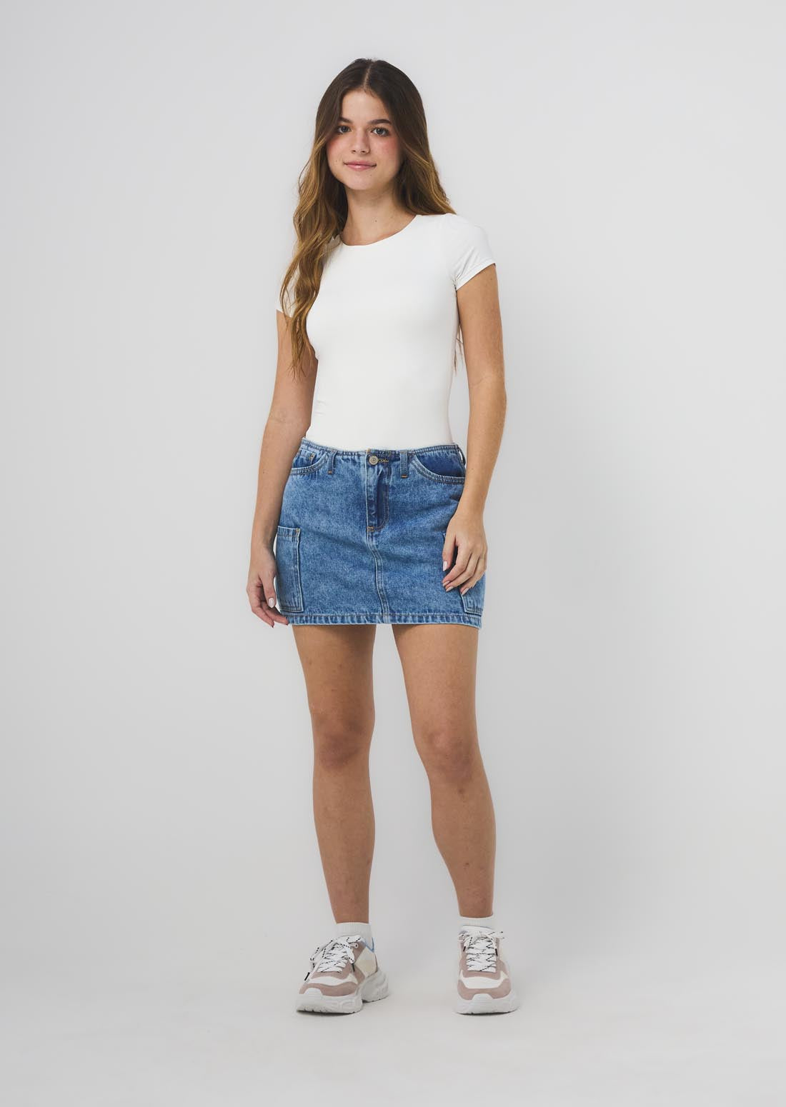 Falda lavado medio con short interno para jóvenes