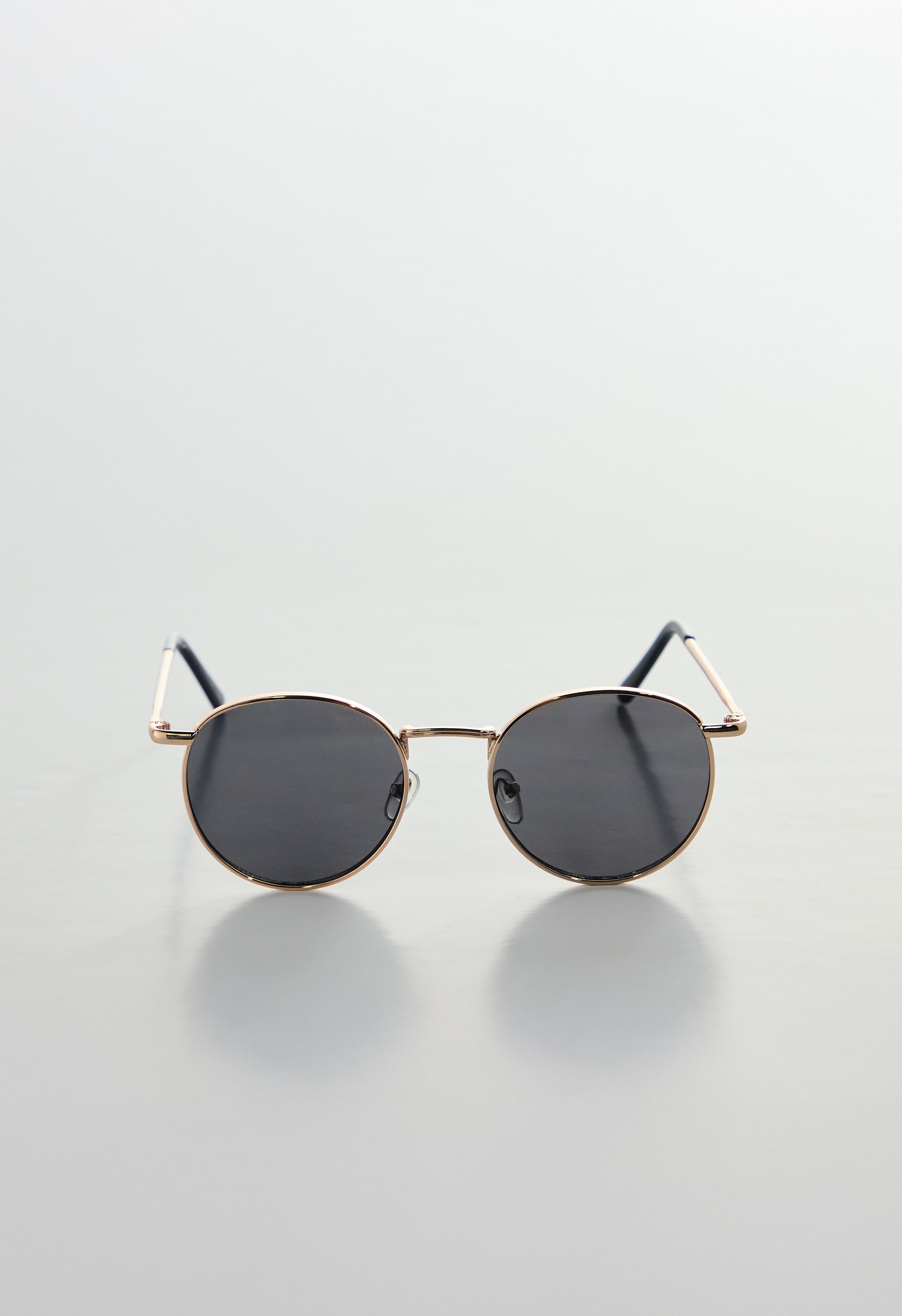 Gafas redondas doradas