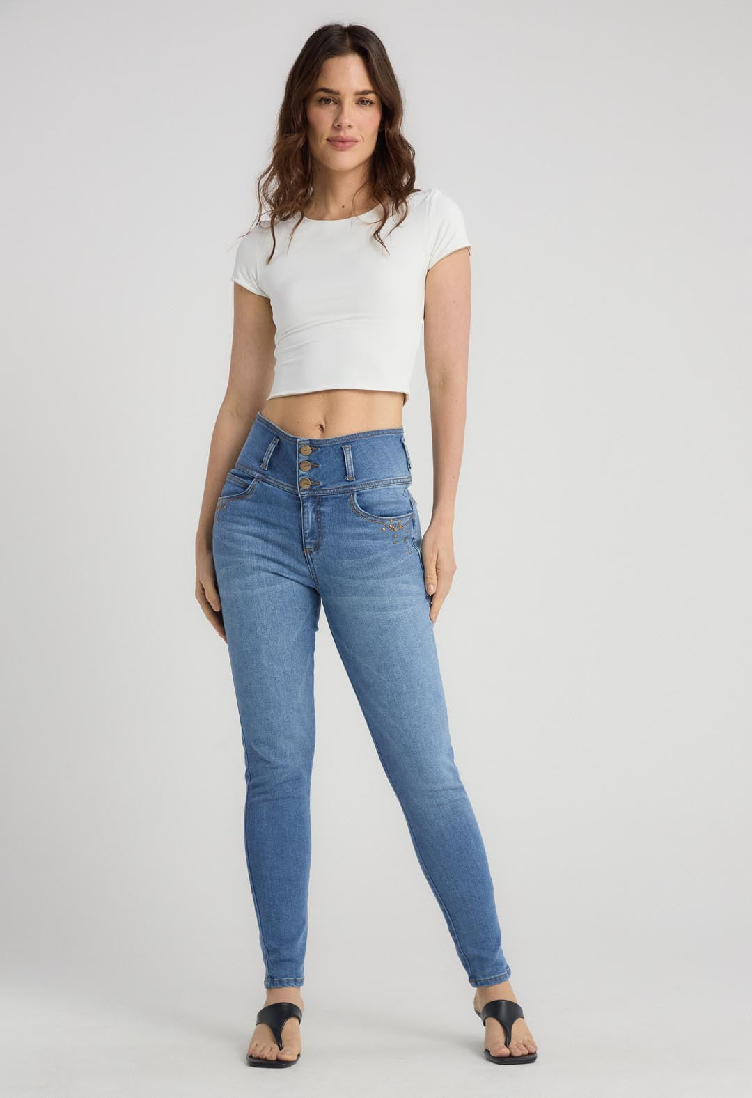 Jean escultor medio con apliques para mujer