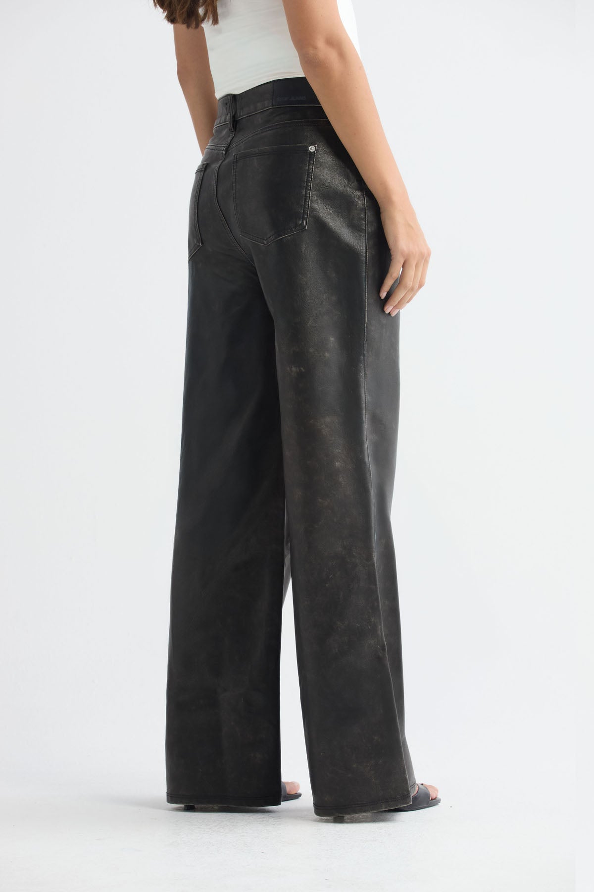 Jean retro negro tela con efecto cuero para mujer
