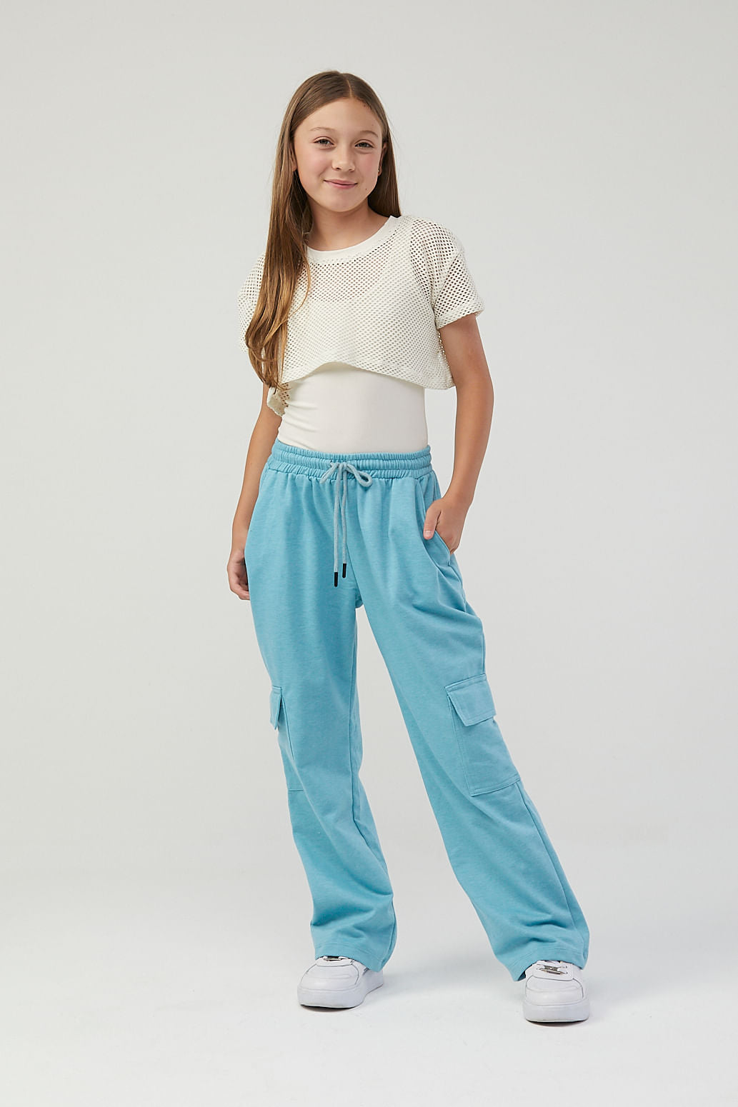 Pantalón azul turquesa con bolsillo cargo para niñas