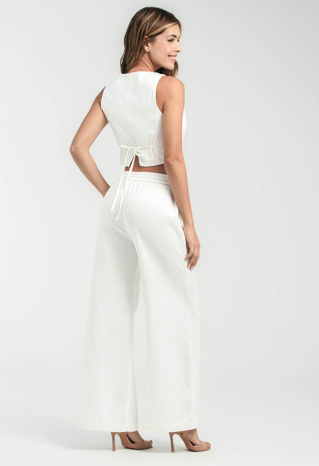 Pantalón marfil tela efecto semilla para mujeres