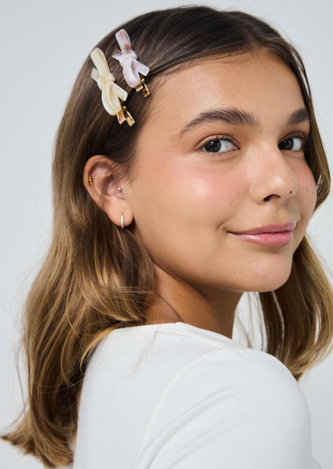 Duo de pinzas en forma de moño para el cabello