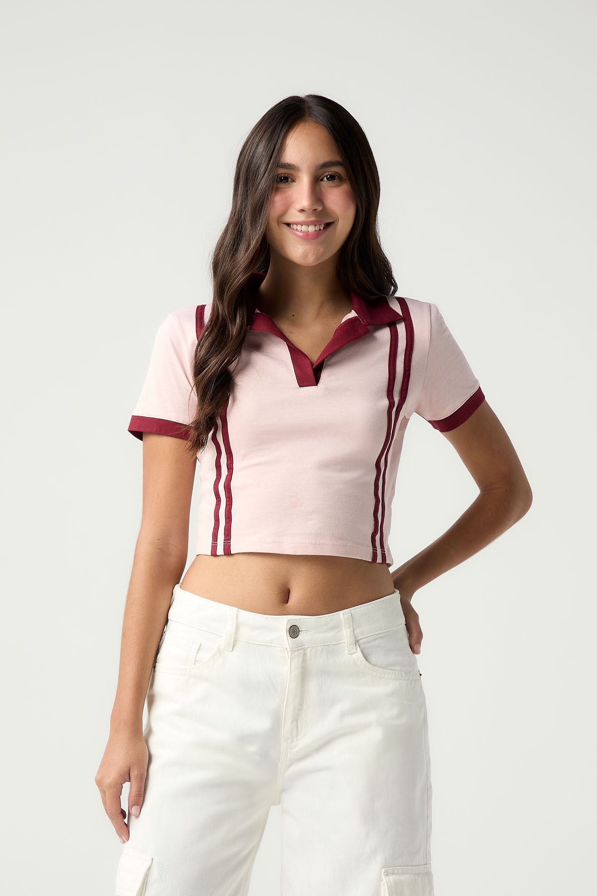 Camiseta polo rosa claro con detalles en contraste para jóvenes