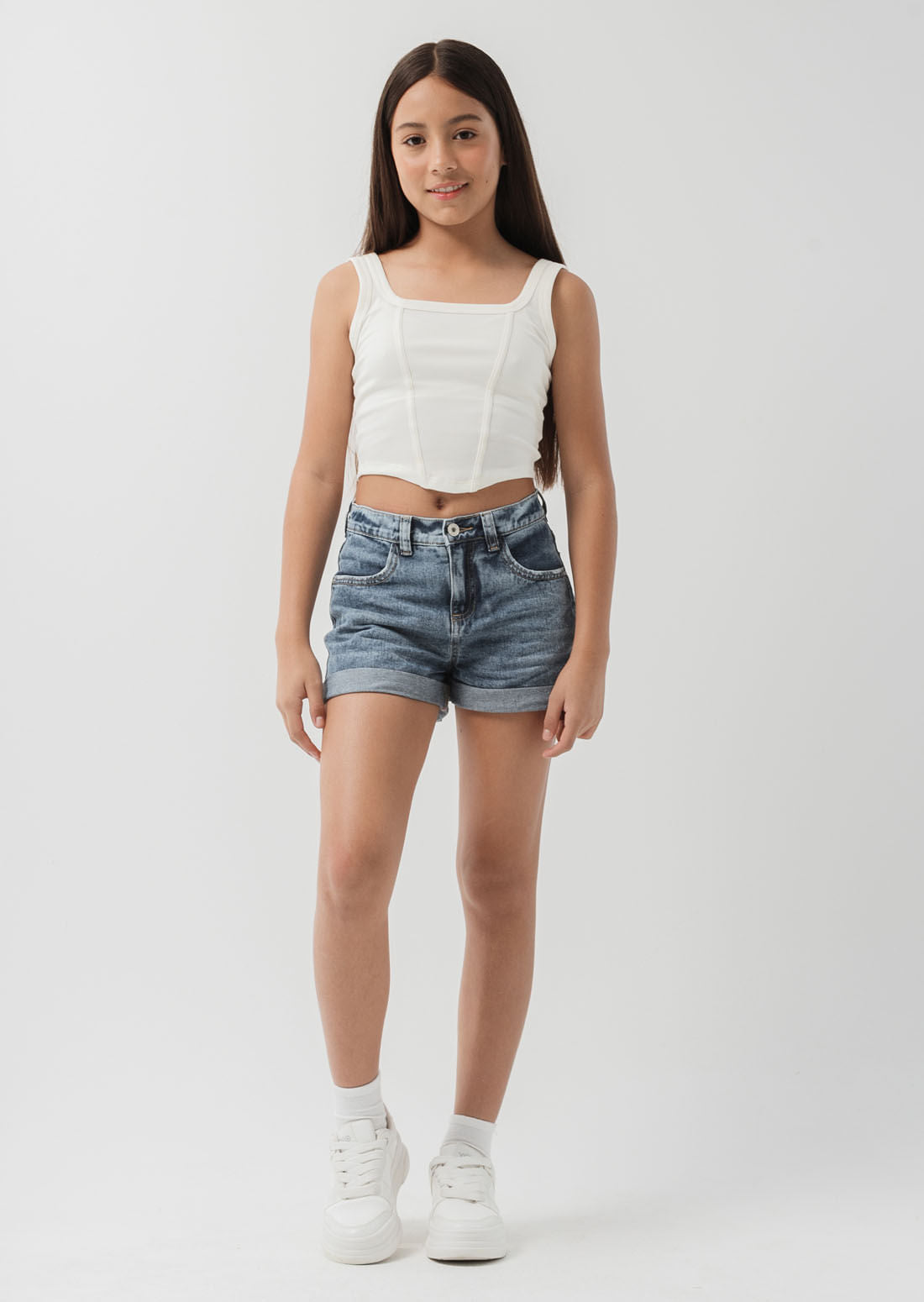 Short azul medio con guardapolvo en ruedo para niñas