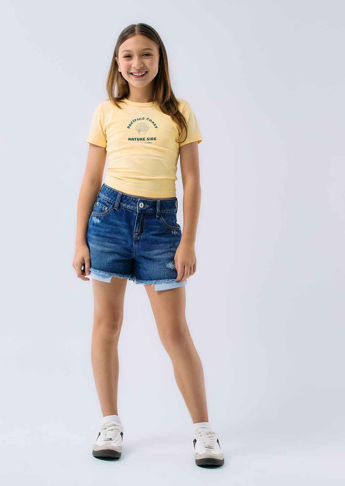 Short medio oscuro ruedo desflecado para niñas