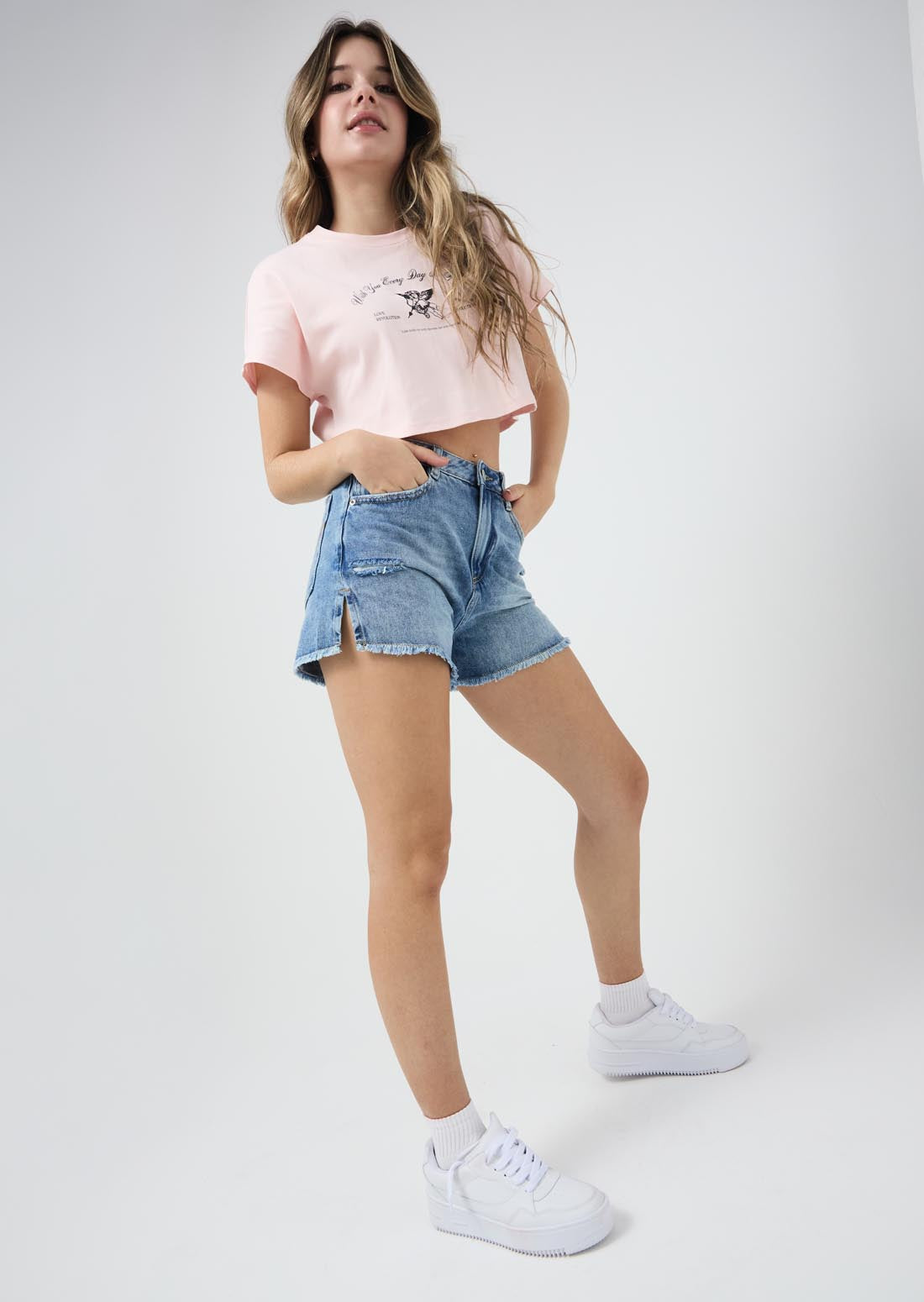 Short medio tiro alto para jóvenes