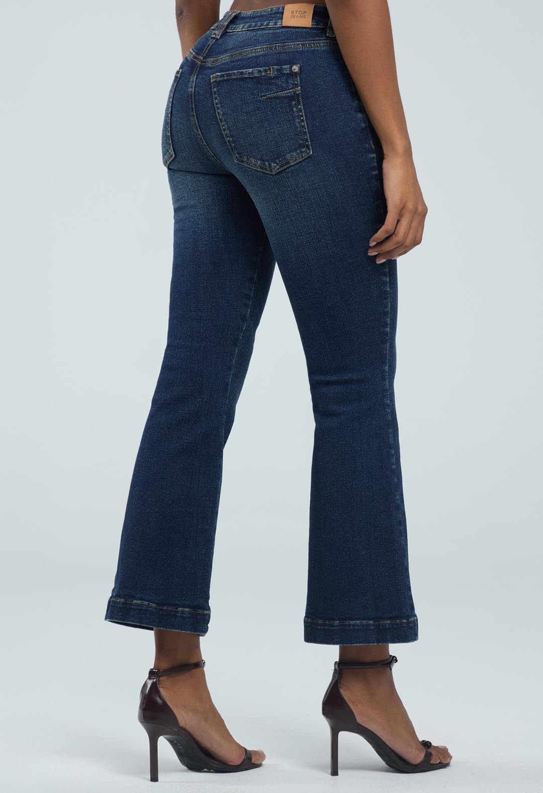 Jean tejano medio oscuro y tiro alto para mujeres