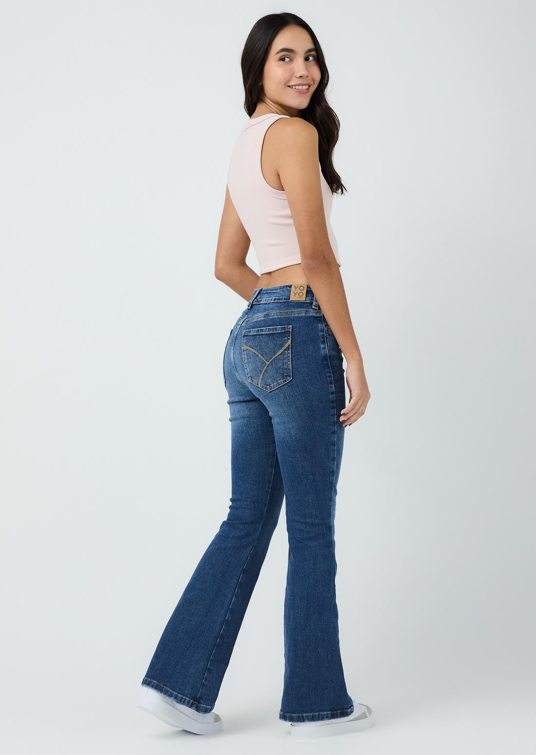 Jean tejano medio oscuro tiro alto para jóvenes