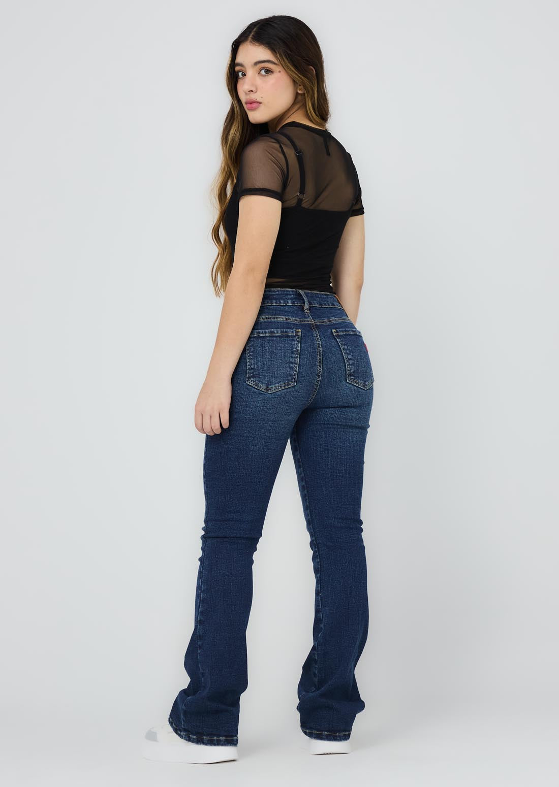 Jean tejano oscuro con rotos en rodilla para jóvenes