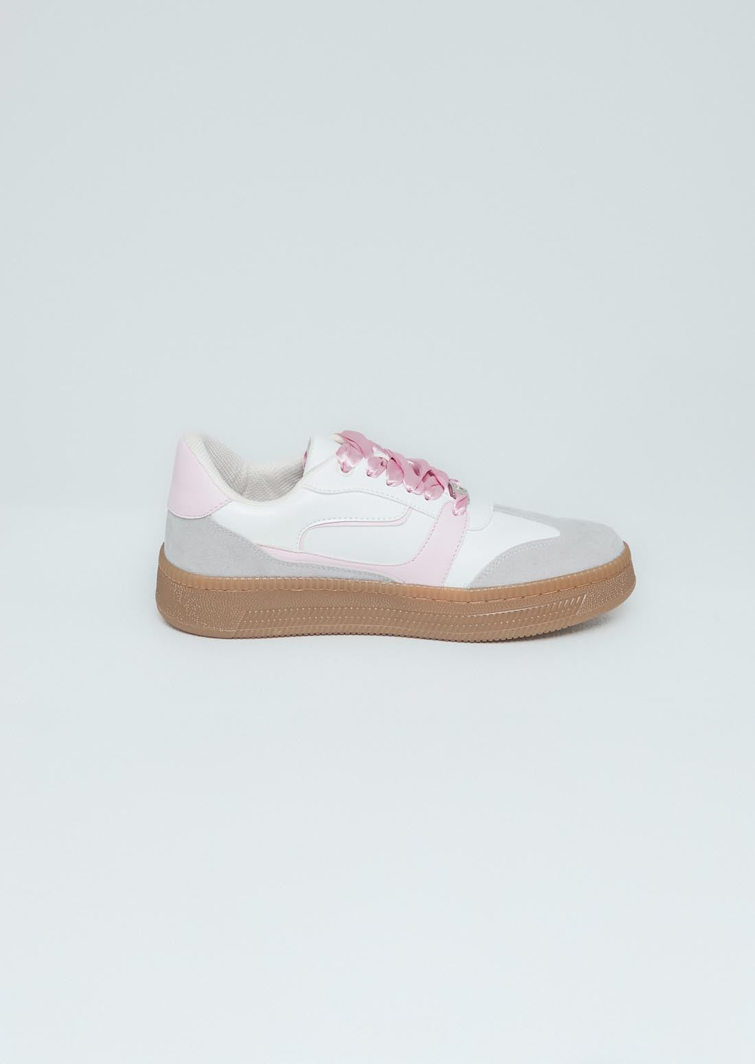 Tenis rosa con cordones en lazo para adolescentes