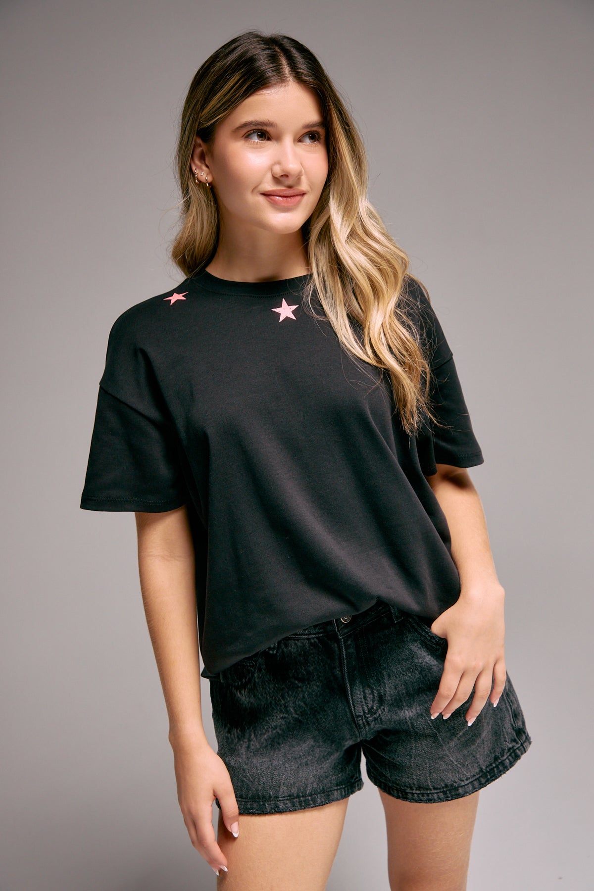 Camiseta negra oversize con estampado para jóvenes