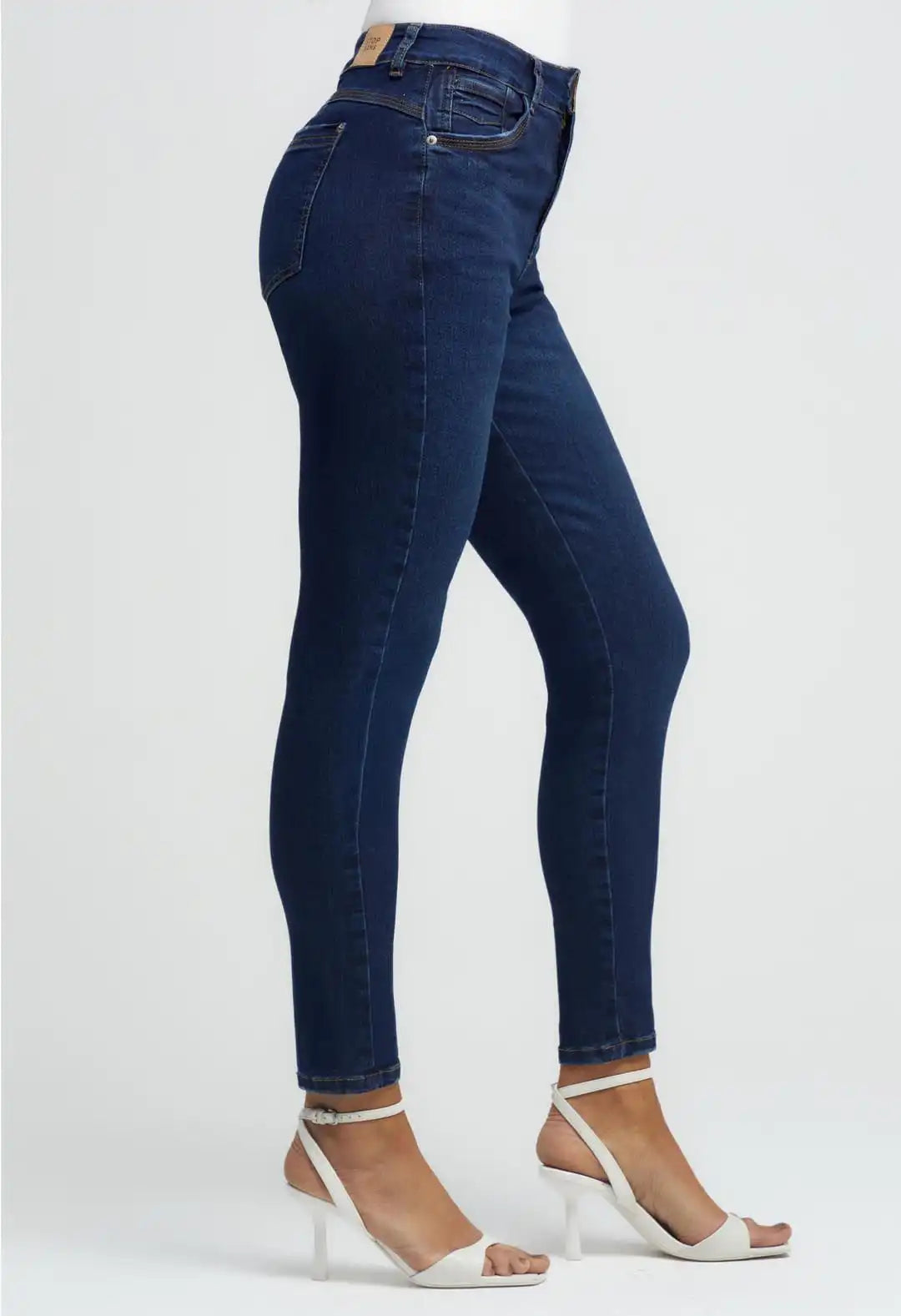 Jean levantacola oscuro detalle en bolsillo para mujeres