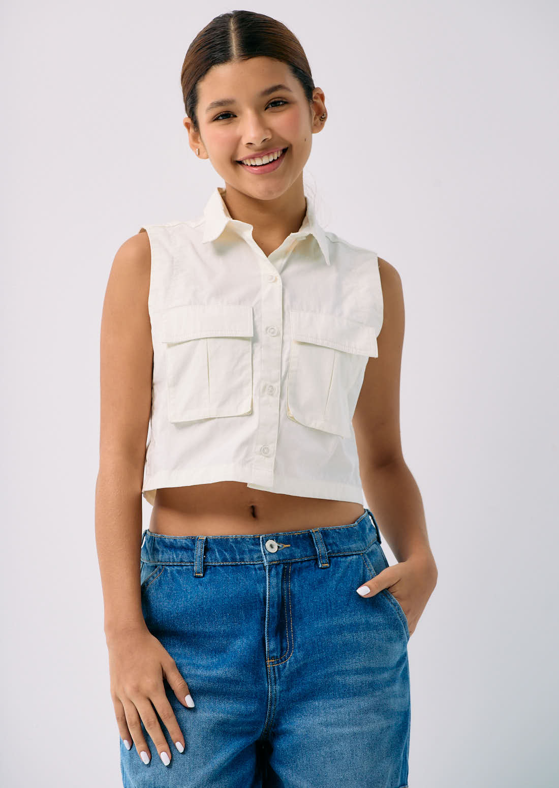 Blusa marfil con bolsillos cargo para adolescentes