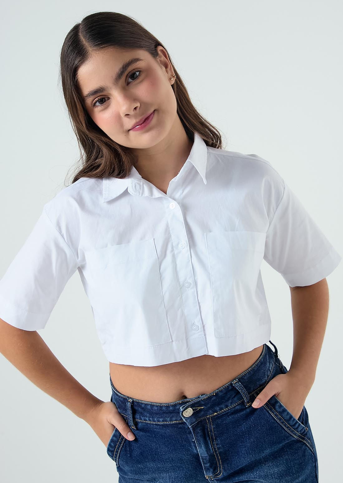 Blusa marfil con nudo enfrente para jóvenes