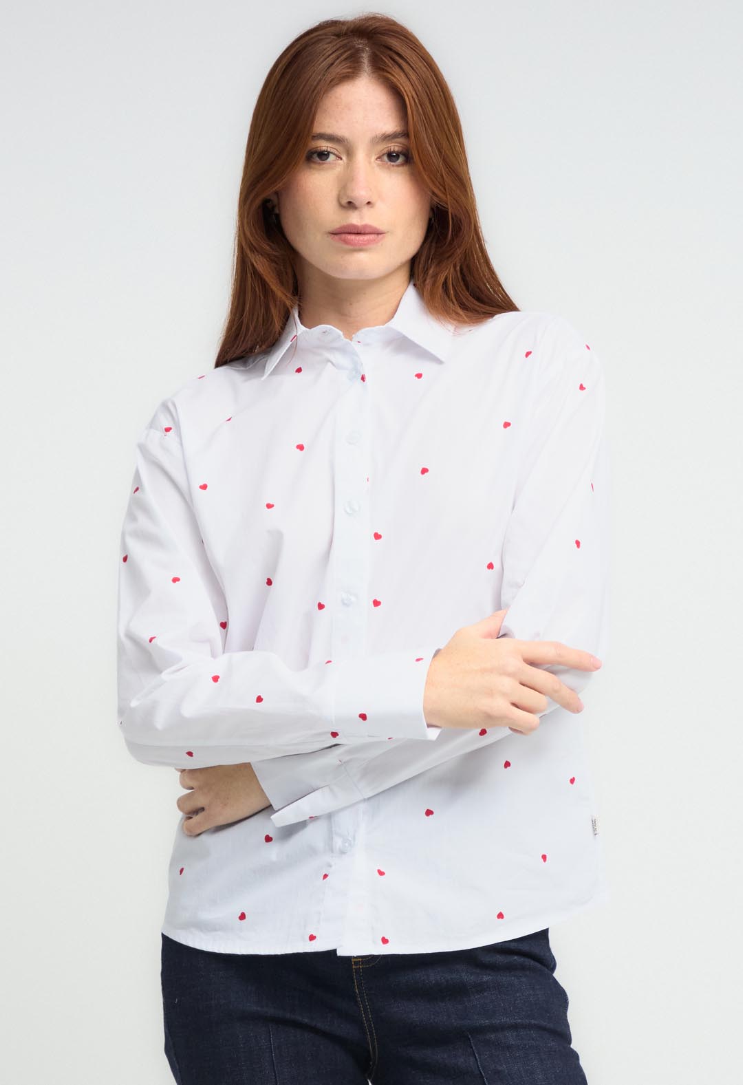 Blusa blanca con detalle en puño para mujeres