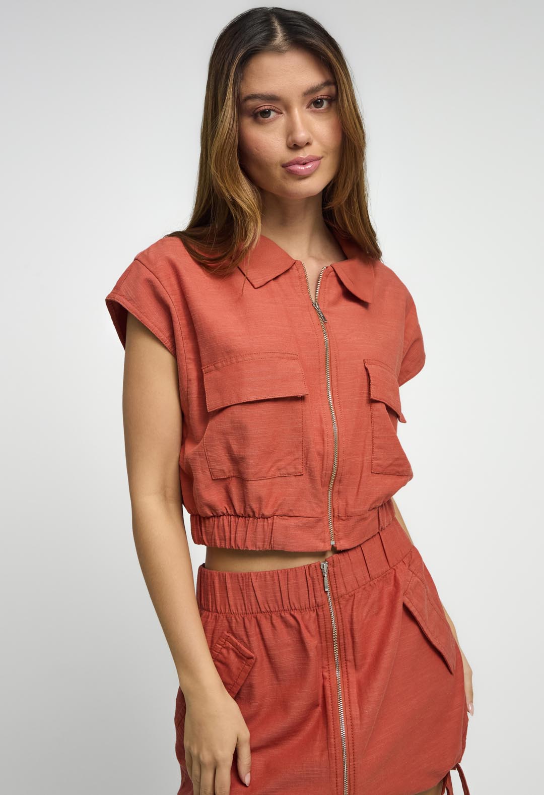 Blusa terracota con cremallera para mujeres
