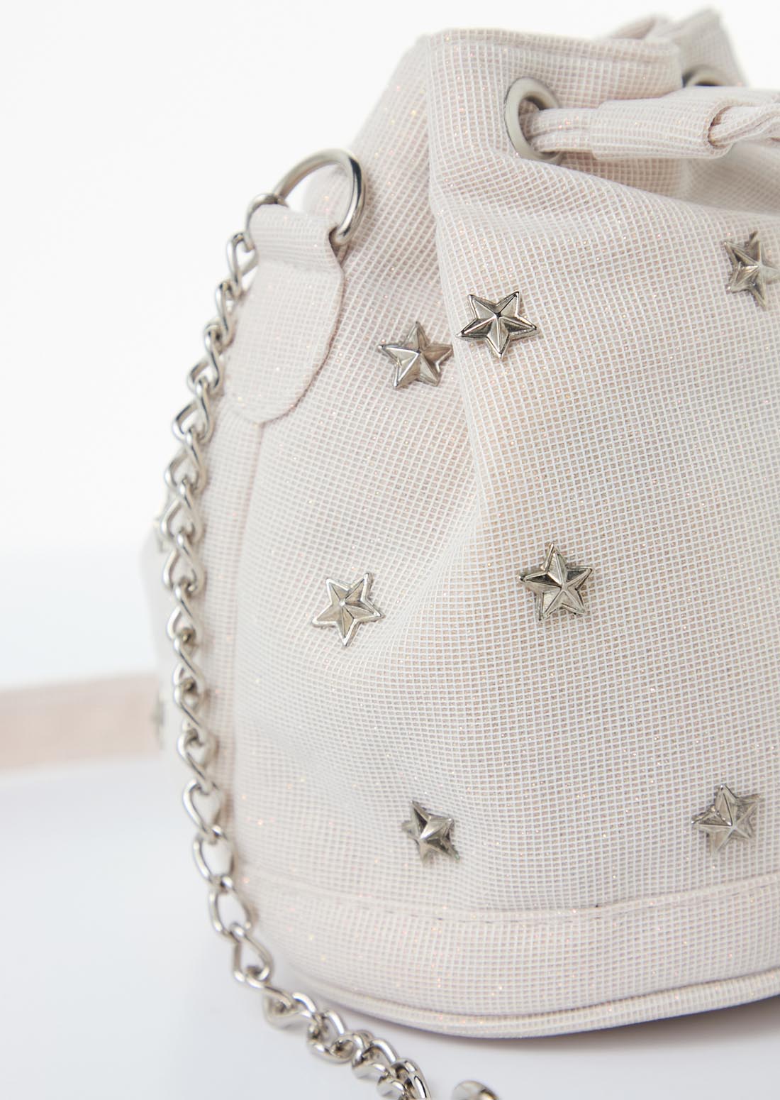 Bolso marfil con taches de estrellas