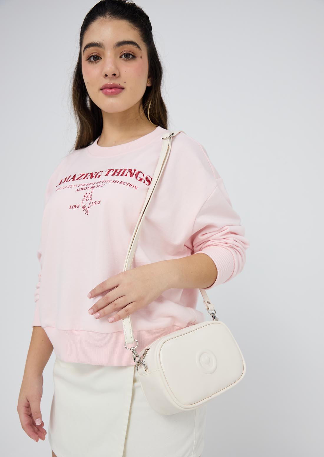 Bolso marfil con tira trenzada