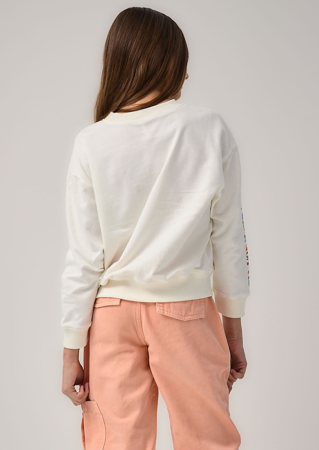 Buzo marfil frente y manga estampada para niñas